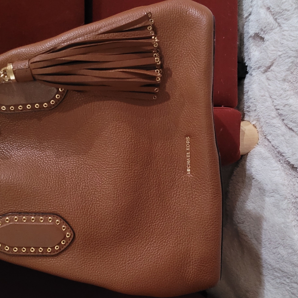 Michael Kors Brown Shoulder Bag with Tassel Detail and Gold Hardware